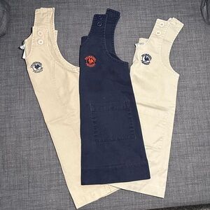 Set of 2 Primrose khaki uniform jumpers, size 5/G5. Good used condition.